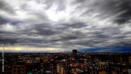 time lapse of clouds over city