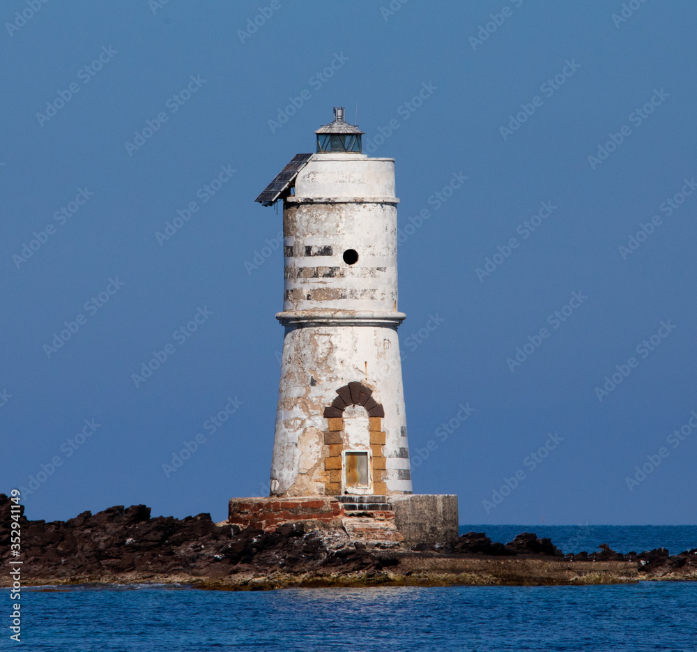 the lighthouse of the boat eater of calasetta, south sardinia, on a beautiful summer day