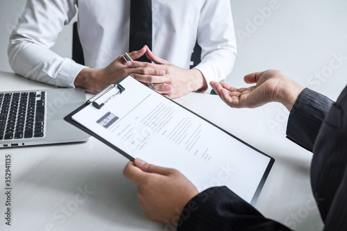 Employer arriving for a job interview, committee listen to candidate answers explaining about his profile and colloquy dream job, manager sitting in job Interview talking in office