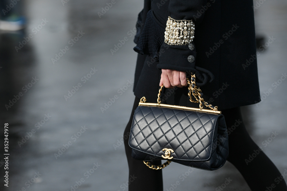 Paris, France – March 3, 2020: Black leather Chanel chain bag