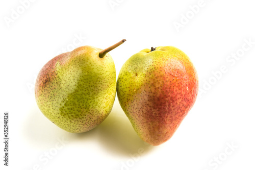 Ripe fresh pear on a white isolated background. Dietary food. Vegetarianism.