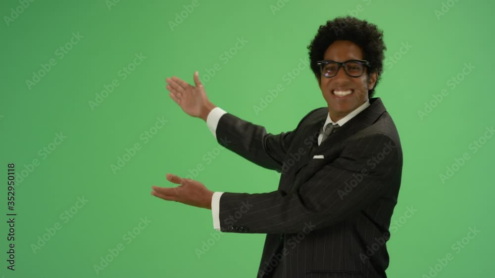Happy Businessman gesturing with arms on green screen Happy Businessman gesturing with arms on green screen