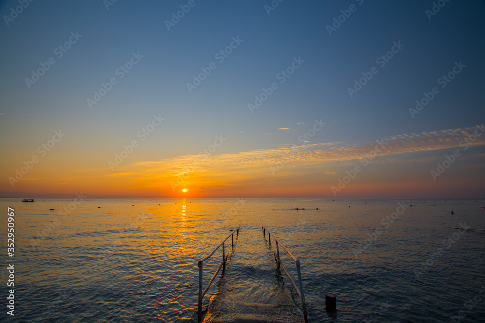 sunset over the sea sunset over the sea