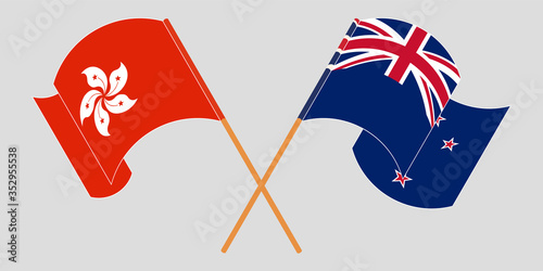Crossed and waving flags of Hong Kong and New Zealand