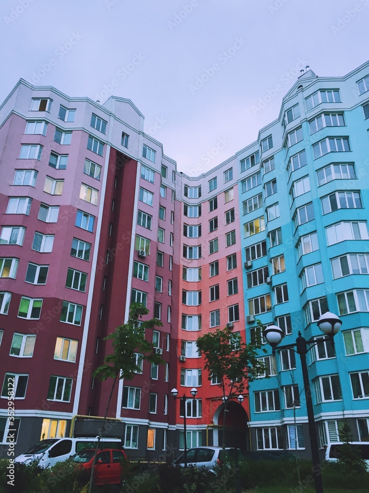 Modern residential building. Colorful residential buildings. Street