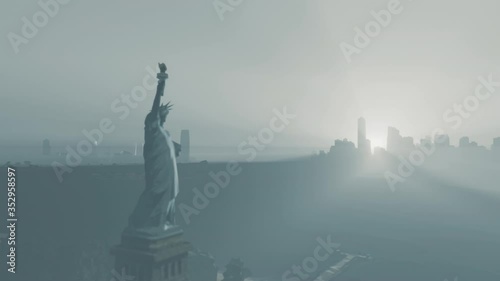 Statue of Liberty and skyline of New York City, Manhattan island, New York City, USA, minimal animation of skyscrapers at foggy morning with title, aerial view.  photo