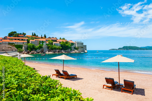 Sveti Stefan island with beautiful beach near Budva, Montenegro. Luxury resort at Adriatic sea. Famous travel destination