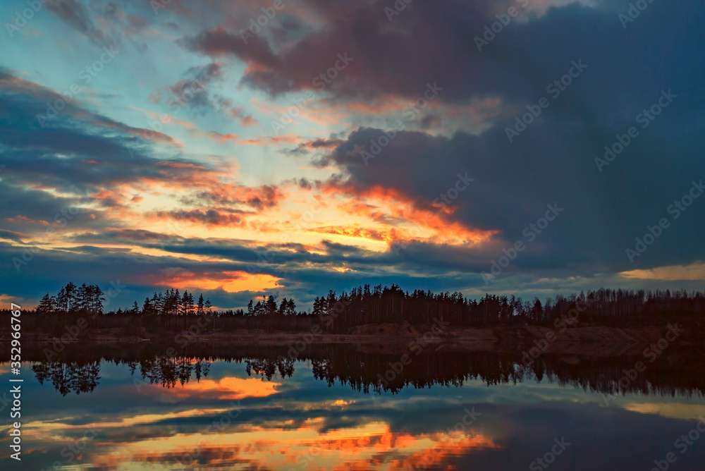 Sunset over the lake in spring. Vsevolozhsk. Leningrad region.
