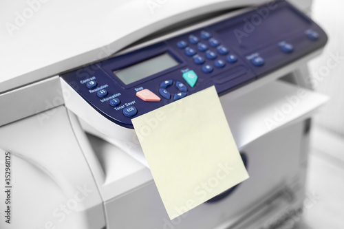 Printer, copier, scanner on color background . Office table. copy space