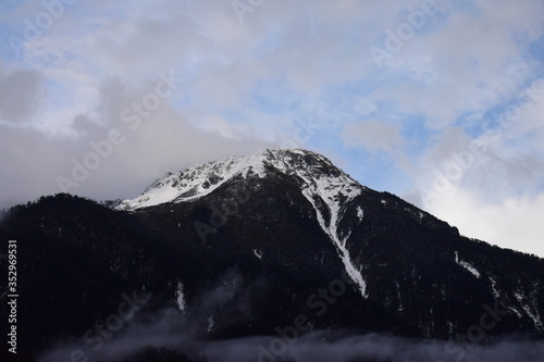 Snow covered rocky mountains somewhere in sikkim india