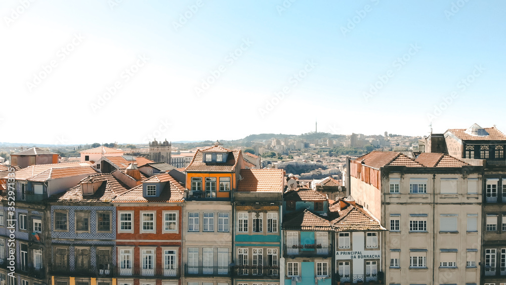 Aerial view of traditional colorful houses at Campo dos Martires da Patria, neat the Clerigos Tower in Porto.
