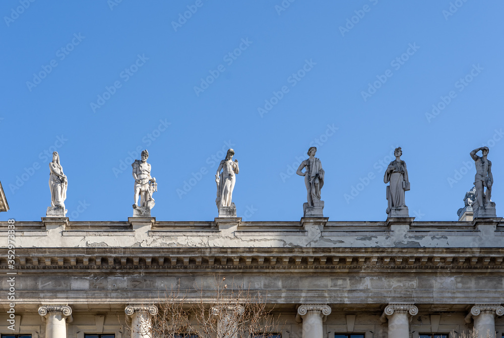 Allegorical sculptures of Attica on top left side of Museum of Ethnography in Budapest