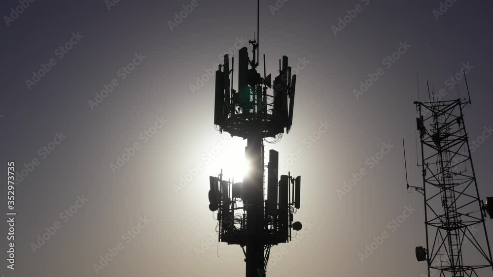 Radio and cellular Antenna silhouette Aerial view
Beautiful slow fly shot of Radio and cellular Antenna silhouette, 5G concept
Radio and cellular Antenna silhouette Aerial view
Beautiful slow fly shot of Radio and cellular Antenna silhouette, 5G concept