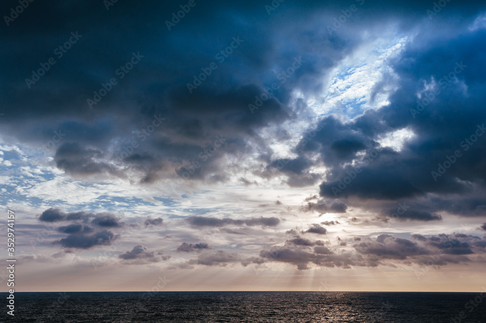 Stormy sky over dark sea. HDR image with copy space