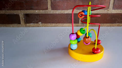 colored children's toy with colored balls