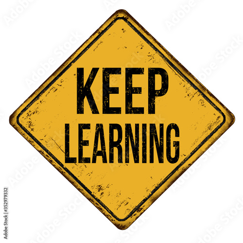 Keep learning vintage rusty metal sign