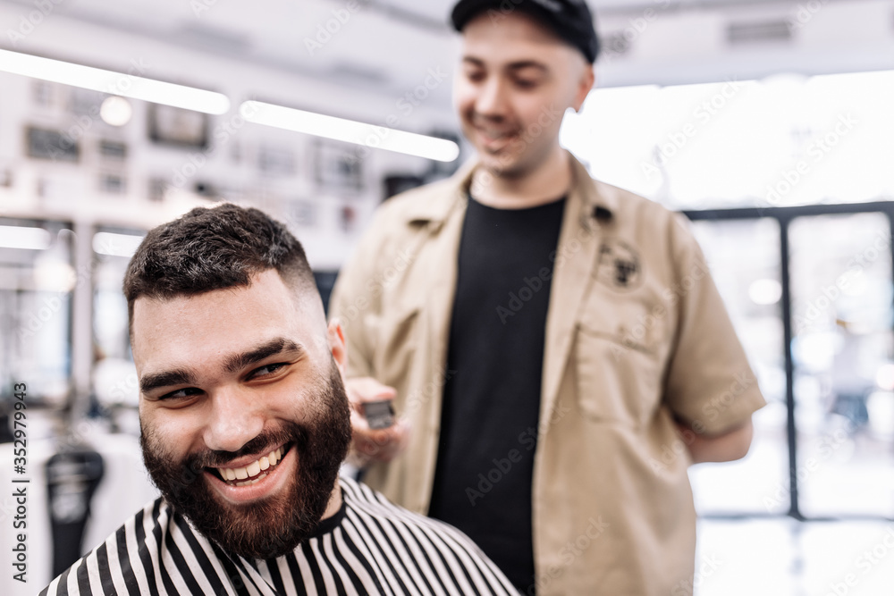 Men's beauty salon. Men's haircut in a barbershop. Men's beauty salon. Men's haircut in a barbershop.