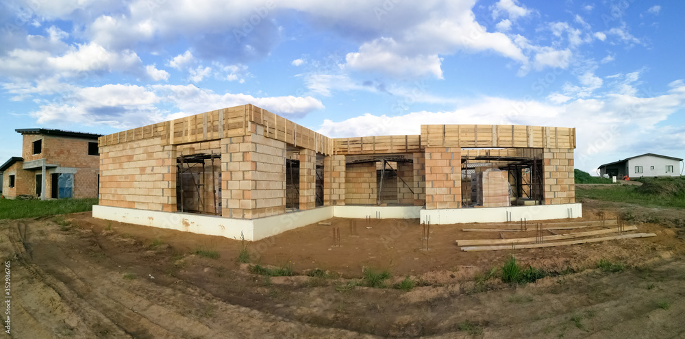 Panorama of house under construction in construction site