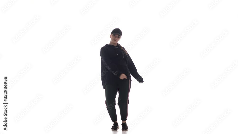 young beautiful woman dancer in black leggings and a black t-shirt dancing hip hop, contemporary, modern street dance, isolated young beautiful woman dancer in black leggings and a black t-shirt dancing hip hop, contemporary, modern street dance, isolated
