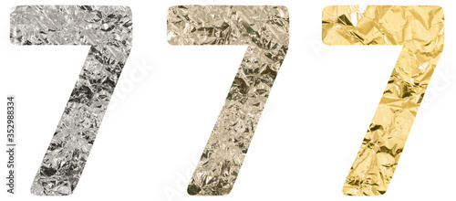 Isolated Font number 7 one made of crumpled titanium, silver, gold foil on white background