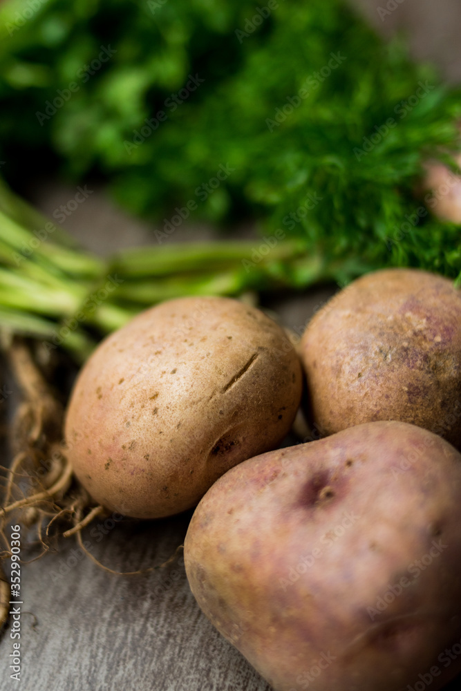 potatoes and green vegetable on the table potatoes and green vegetable on the table