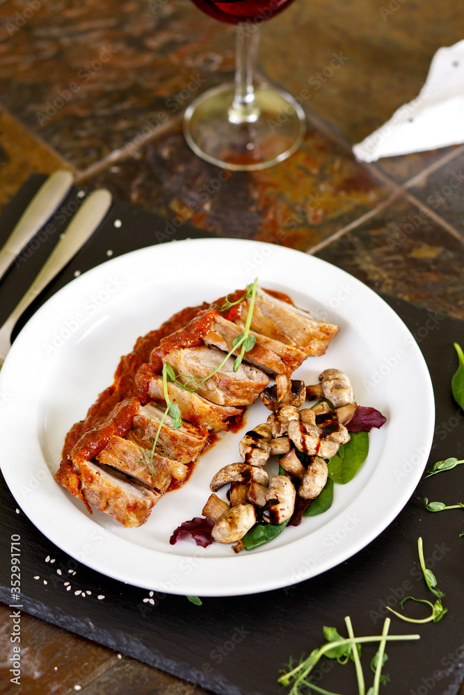 Veal medallions with bacon and mushrooms under adjika Veal medallions with bacon and mushrooms under adjika