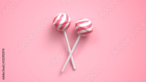 Tableau sur toile Two sweet striped pink and white lollipops on stick on bright pink background