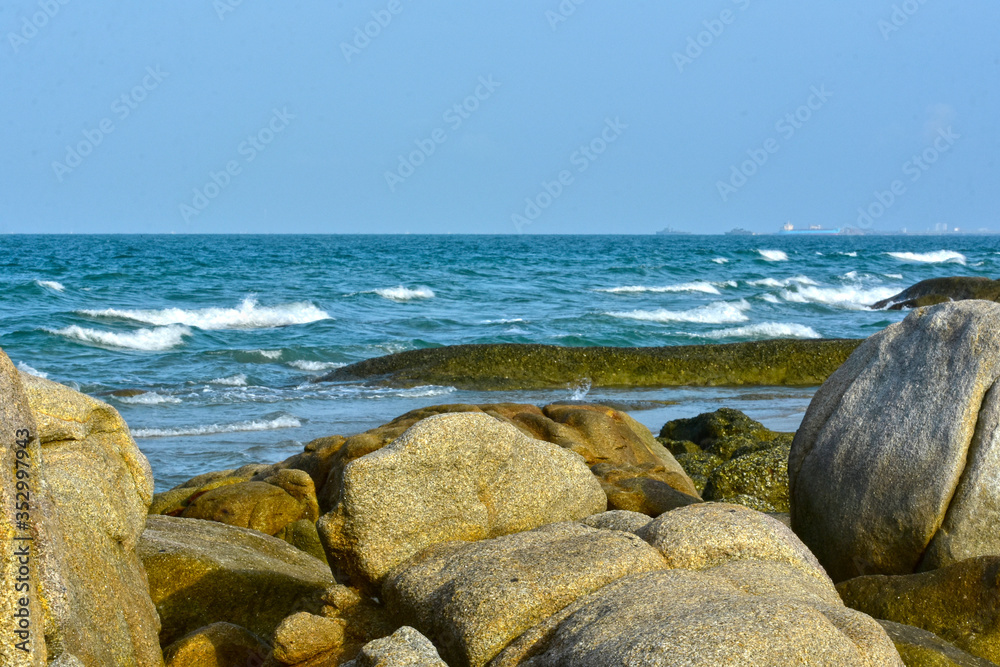 Large rocks located on the beautiful seashore Large rocks located on the beautiful seashore