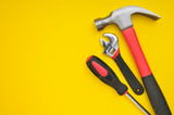 Group of tools on yellow background