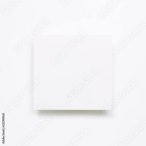 White memo pad, empty paper on white background. top view, copy space © Sanga