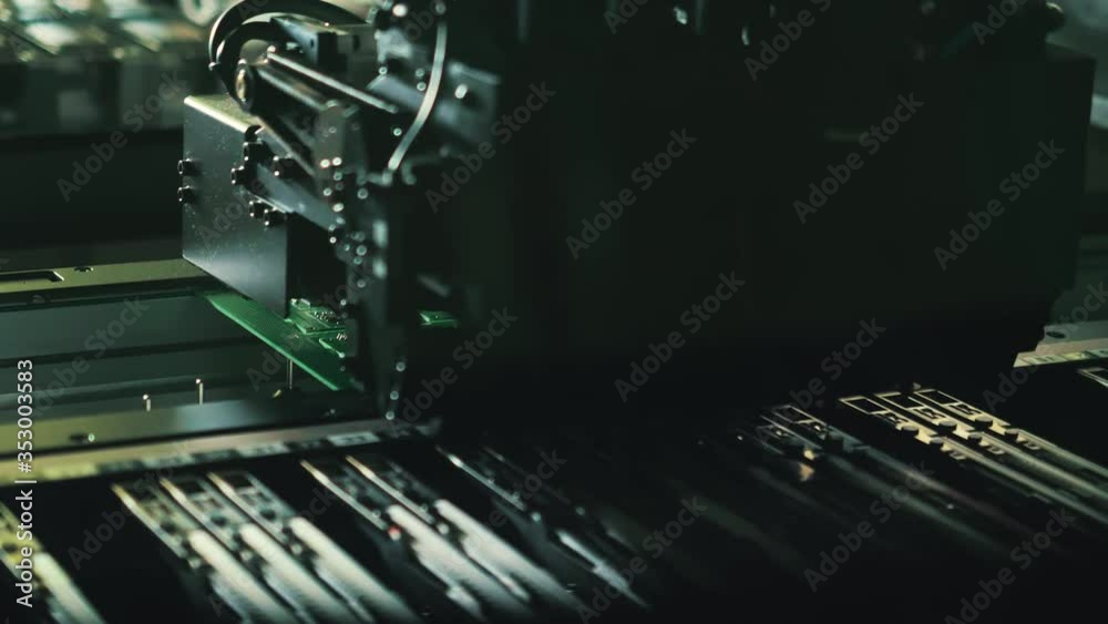 Robotic chip manufacturing. Automatic electronic soldering of microchips. Close-up.