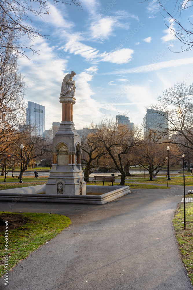 Ether Monument in Boston Public Garden in winter , blue sky background.The Ether Monument, located towards the corner of Arlington and Beacon streets in the northwest corner of the garden.