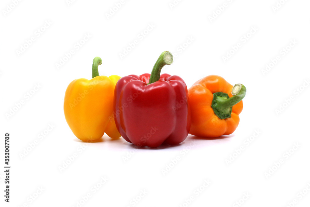yellow and orange and red paprika isolated on white background yellow and orange and red paprika isolated on white background