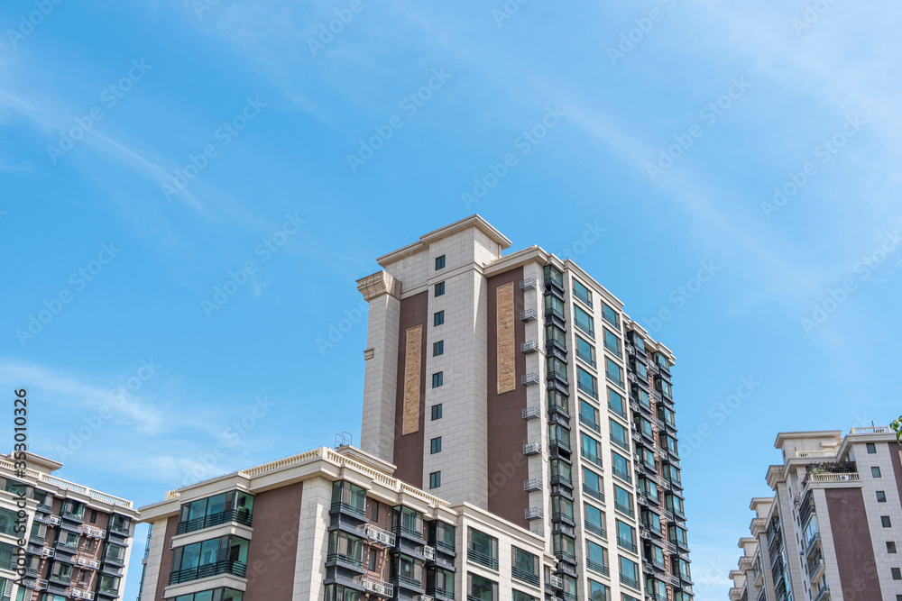 
Residential area under blue sky and white clouds