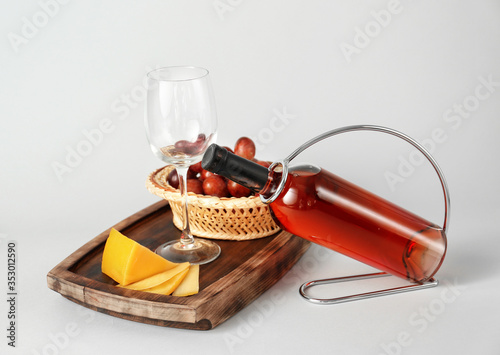 Rose wine bottle and empty ...