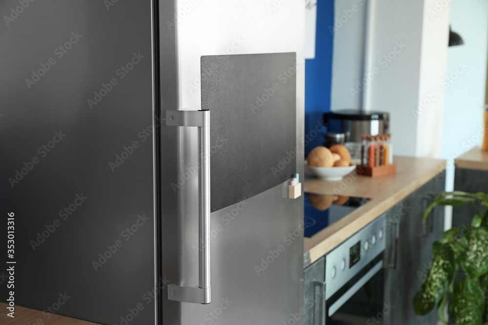 Chalkboard on door of refrigerator in kitchen Chalkboard on door of refrigerator in kitchen