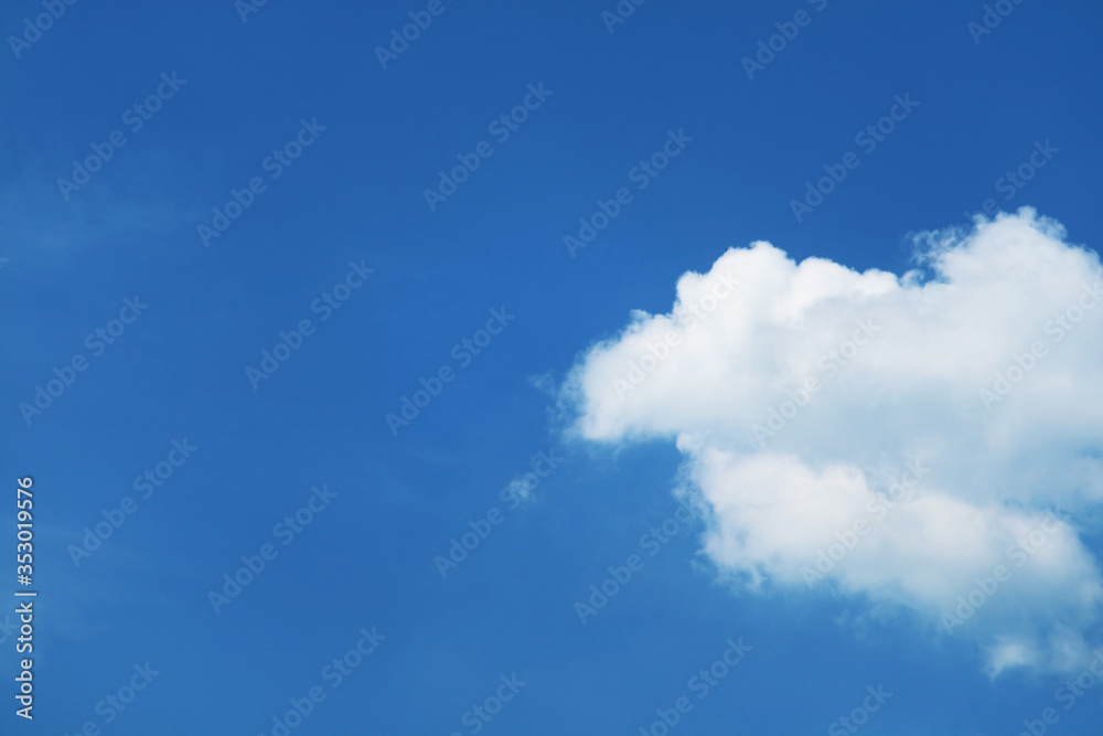 pure white heap cloud and sunlight shining and pass on clear blue sky pure white heap cloud and sunlight shining and pass on clear blue sky