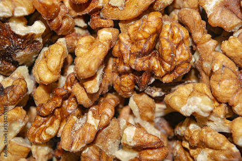 Peeled walnuts close-up. Surface texture. Healthy diet.