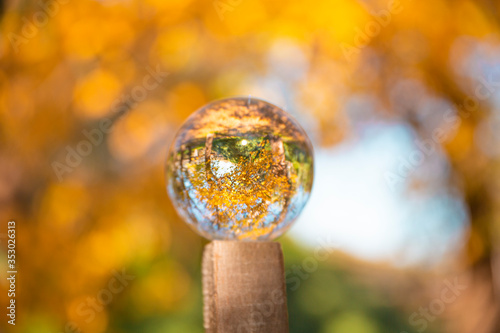 Obraz na płótnie Colourful Autumn Outdoor Nature Landscape Scene with Lens Ball w salonie