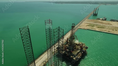 Aerial view of an offshore drilling rig near the ocean in Mexico photo