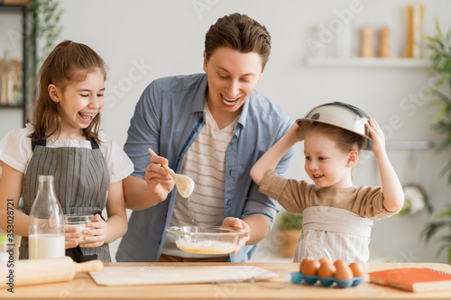 family are preparing bakery together