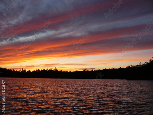 sunset over lake baxter state park © Gary