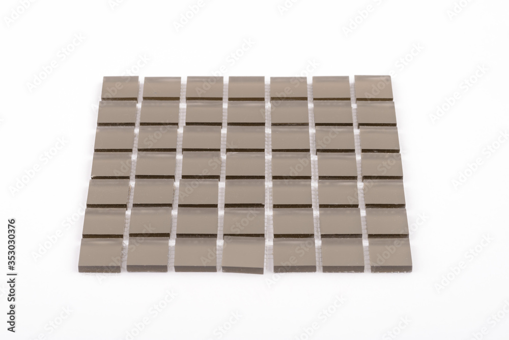 Glass and mirror mosaic without reflections isolated on a white background. For construction and repair in the bathroom, pool, kitchen. Glass and mirror mosaic without reflections isolated on a white background. For construction and repair in the bathroom, pool, kitchen.