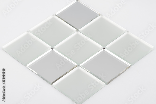 Glass and mirror mosaic without reflections isolated on a white background. For construction and repair in the bathroom  pool  kitchen.