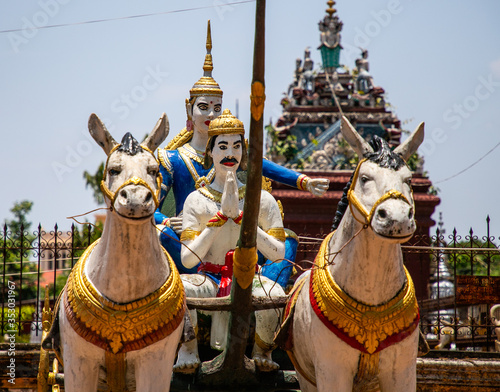 horse statues inside Wat Damrey Sar (Damrey Sor Pagoda) a buddhist temple of Battambang, Cambodia