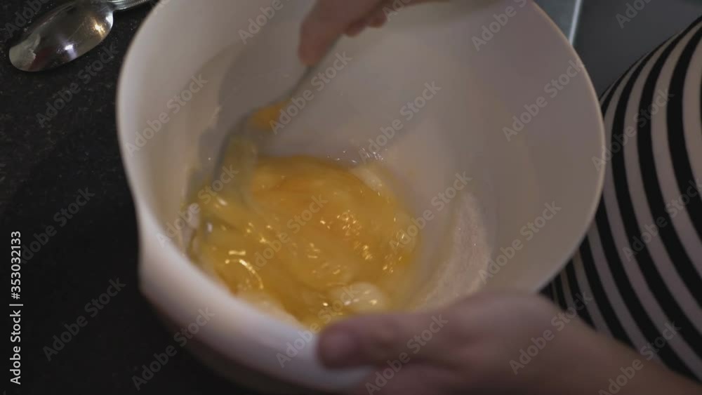 Mix the Eggs and Sugar in the Bowl with a Fork. Mix the Eggs and Sugar in the Bowl with a Fork.