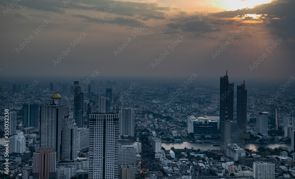  panoramic skyline of Bangkok at sunset from King Power Mahanakhon, Bangkok, Thailand