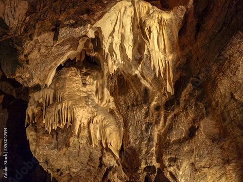 colorful stalactites in the cave photo