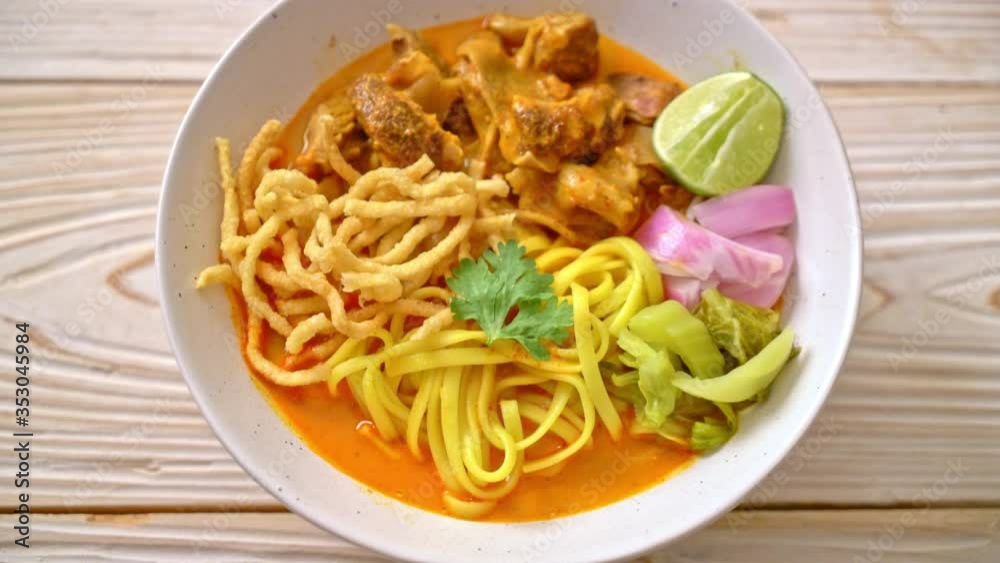 Northern Thai noodle curry soup with braised pork - Thai food style Northern Thai noodle curry soup with braised pork - Thai food style