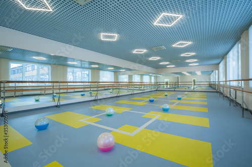gymnastics hall, gymnasium for training with mirrors, a place for ballet, for stretching, for training, for group training, a bright spacious large hall photo
